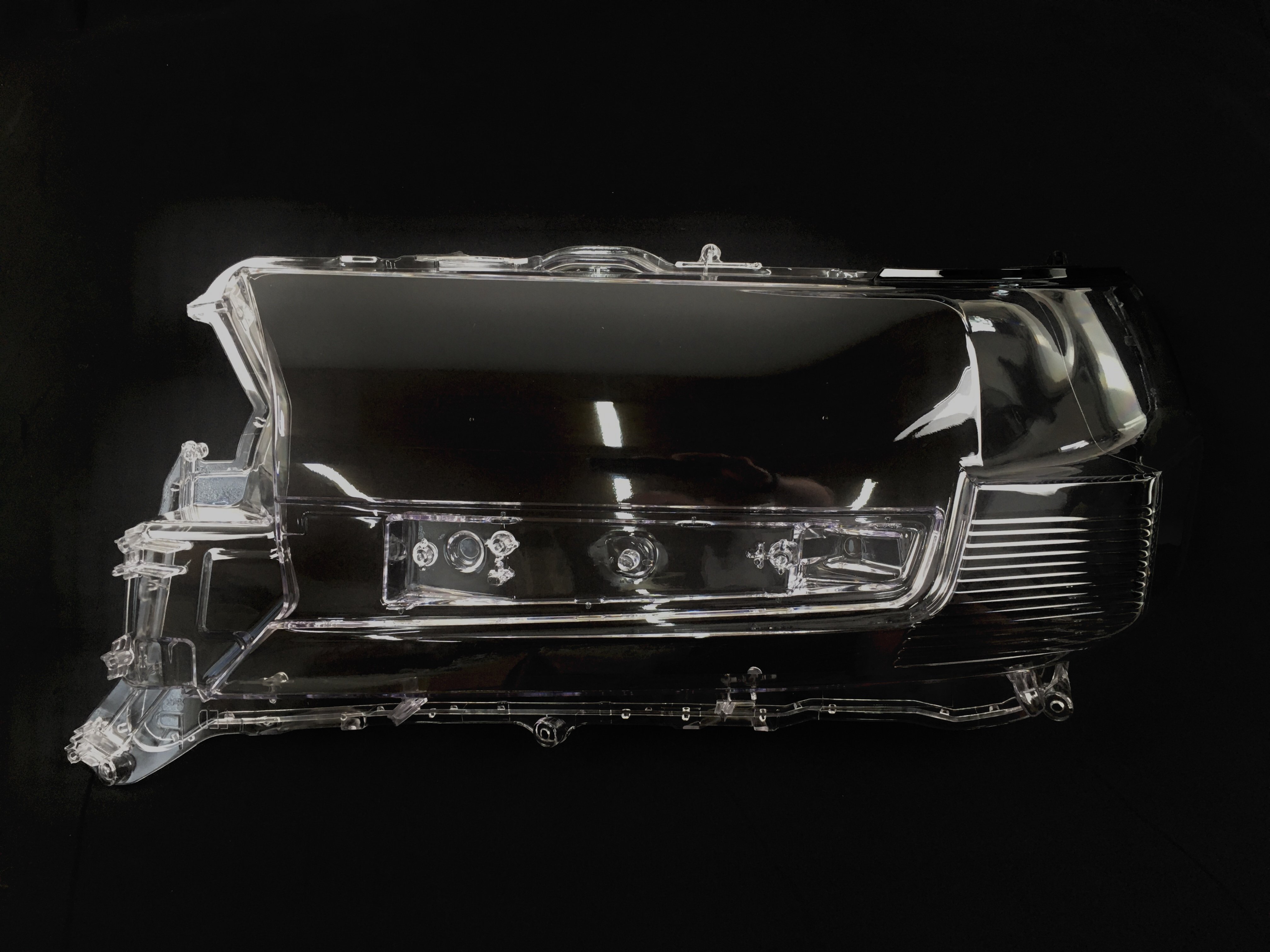 Скло фари Toyota Land Cruiser 200 2016-2020 ліве