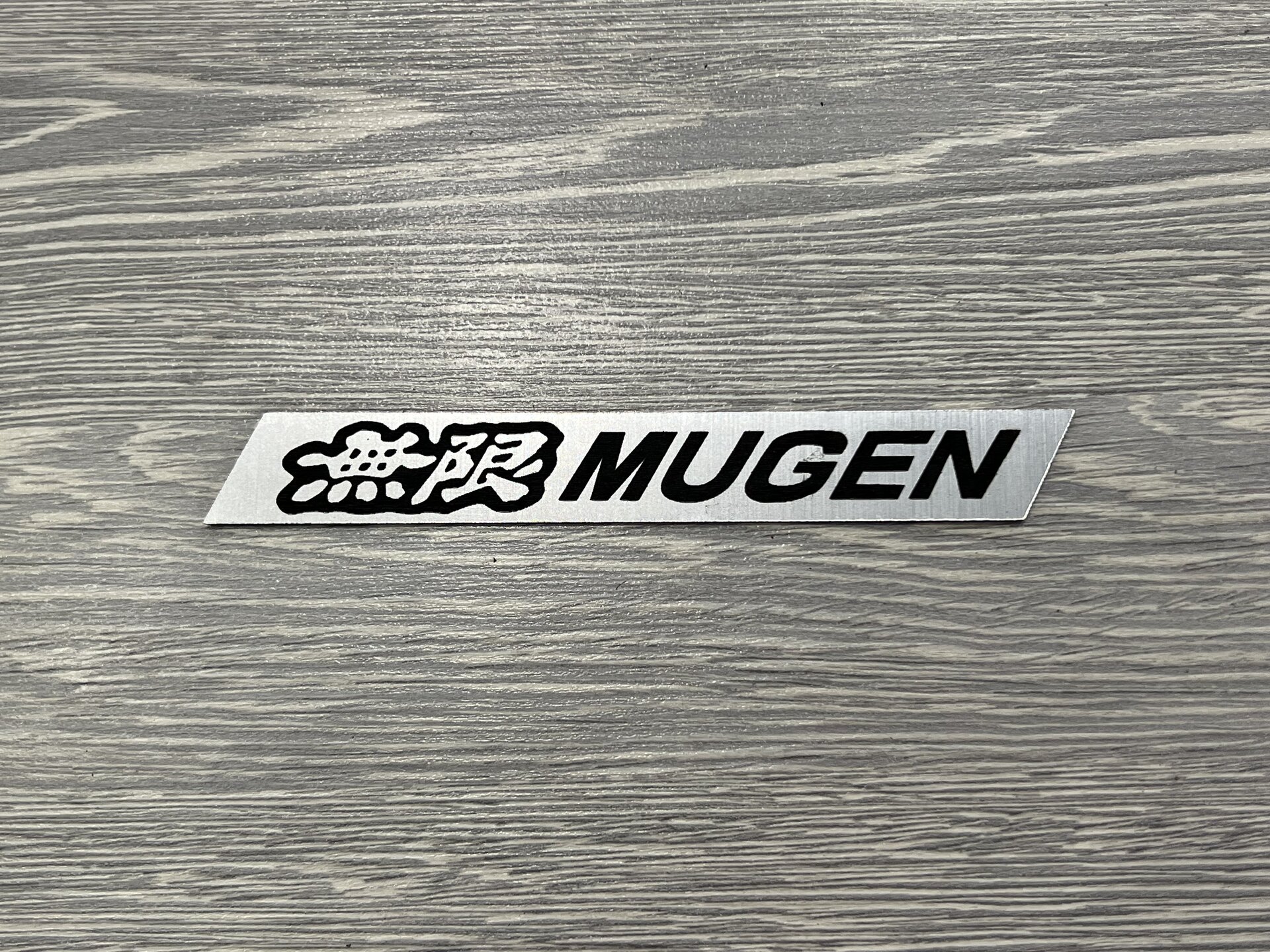 Емблема Mugen для Honda ABS пластик (14см)
